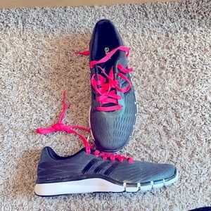 Woman Adidas Adipure running shoe 8.5 black.  Never worn.